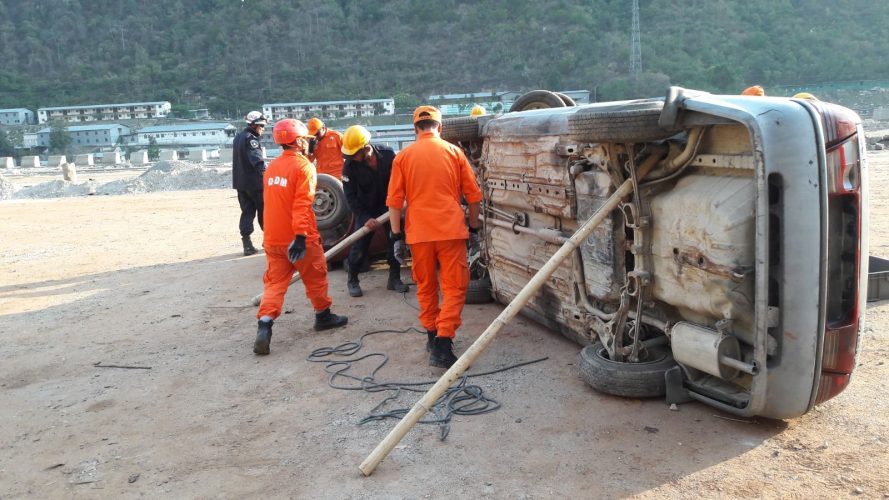 Rescue technicians stabilising an overturned vehicle